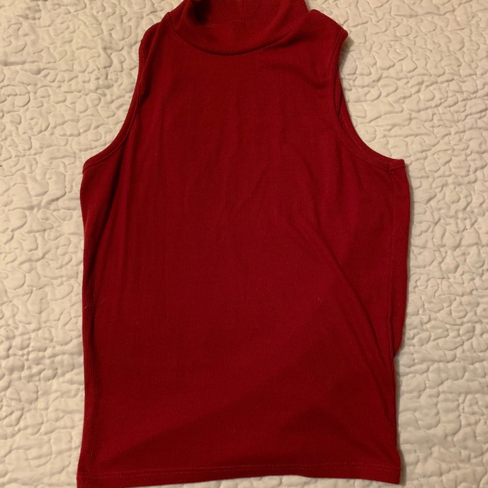 Sleeveless red turtleneck